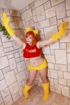  1girl animal_ears asian bear_ears chouzuki_maryou cosplay gloves highres orange_hair photo plump pooh pooh_(cosplay) shirt solo t-shirt winnie_the_pooh 
