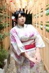 1girl asian black_hair breasts chouzuki_maryou highres japanese_clothes kimono large_breasts photo plump solo 