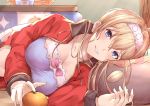  1girl ahoge basket blonde_hair blue_eyes blush breasts cleavage collarbone commentary_request food fruit granblue_fantasy grin haido_(ryuuno_kanzume) hair_intakes hairband jeanne_d&#039;arc_(granblue_fantasy) kotatsu large_breasts long_hair looking_at_viewer lying mandarin_orange medium_breasts navel on_side pajamas pillow smile solo stuffed_toy table track_suit 