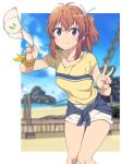  1girl baseball_cap beach black_eyes blurry blurry_background commentary day eyebrows_visible_through_hair hat hat_removed headwear_removed holding holding_hat koshigaya_natsumi looking_at_viewer non_non_biyori one_side_up orange_hair outdoors shirt short_shorts shorts sidarim solo t-shirt v 