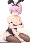  1girl absurdres animal_ears aogumaptticrash bangs bare_arms bare_shoulders blush breasts bunny_ears bunnysuit cleavage collarbone commentary_request eyebrows_visible_through_hair fate/grand_order fate_(series) fishnet_legwear fishnets grabbing hair_over_one_eye highres kneeling large_breasts lavender_hair looking_at_viewer mash_kyrielight mole mole_on_breast purple_eyes purple_hair short_hair simple_background smile solo thighhighs white_background 