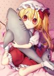  1girl :t a bangs bed blonde_hair bobby_socks bow commentary_request crystal dress eyebrows_visible_through_hair flandre_scarlet full_body hair_between_eyes hat hat_bow highres holding holding_stuffed_animal indoors kyouda_suzuka long_hair looking_at_viewer mob_cap no_shoes one_side_up petticoat puffy_short_sleeves puffy_sleeves red_bow red_dress red_eyes shark shirt short_sleeves sitting socks solo stuffed_animal stuffed_shark stuffed_toy touhou wariza white_headwear white_legwear white_shirt wings 