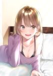  1girl :d absurdres bangs bare_shoulders bed black_bra blush bra breasts brown_eyes brown_hair cleavage collarbone commentary_request highres indoors leg_up long_hair long_sleeves looking_at_viewer lying off_shoulder on_bed on_stomach open_mouth original pillow purple_shirt rinku_(rin9) shirt smile solo underwear 