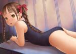  1girl ass blurry bow braid brown_eyes brown_hair depth_of_field feet_out_of_frame hair_bow hair_ornament highres indoors looking_at_viewer looking_back lying on_stomach one-piece_swimsuit original school_swimsuit sidelocks solo swimsuit wadachitokakeru 