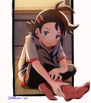  1boy antenna_hair blue_eyes blush closed_mouth commentary_request eyelashes goh_(pokemon) grey_shirt highres looking_down male_focus matsuno_opa pants pokemon pokemon_(anime) pokemon_journeys red_socks shirt short_hair short_sleeves sitting smile socks solo split_mouth twitter_username wooden_floor 