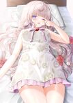  1girl bed blunt_bangs blush commentary commission dress eyeshadow floral_print flower highres himeno_aimu indie_virtual_youtuber long_hair makeup ohagetty open_mouth pillow pink_flower pink_hair pink_rose purple_eyes purple_eyeshadow rose skeb_commission solo virtual_youtuber white_dress 