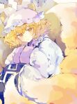  1girl absurdres animal_hat blonde_hair blue_tabard closed_mouth commentary dress expressionless feet_out_of_frame fox_tail hands_in_opposite_sleeves hat highres knees_up looking_at_viewer medium_hair mob_cap multiple_tails nikorashi-ka solo tabard tail touhou white_dress white_headwear yakumo_ran yellow_eyes 