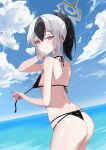  1girl absurdres ass bare_arms bare_legs bare_shoulders bikini black_bikini black_hair black_horns blue_archive blush breasts closed_mouth cowboy_shot day demon_horns grey_hair grey_halo hair_between_eyes halo highres horns kayoko_(blue_archive) looking_at_viewer multicolored_hair ocean outdoors ponytail red_eyes short_hair small_breasts smile solo star1ynight swimsuit 