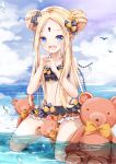  1girl :d abigail_williams_(fate/grand_order) bangs bare_arms bare_shoulders bikini black_bikini black_bow blonde_hair blue_eyes blue_sky blush bow cloud cloudy_sky collarbone commentary_request day double_bun emerald_float eyebrows_visible_through_hair fang fate/grand_order fate_(series) forehead full_body hair_bow hands_up highres holding holding_key horizon key keyhole kneeling long_hair looking_at_viewer mutang ocean open_mouth orange_bow outdoors parted_bangs polka_dot polka_dot_bow sidelocks sky smile solo stuffed_animal stuffed_toy swimsuit teddy_bear very_long_hair water 