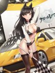  1girl absurdres animal_ears arm_up atago_(azur_lane) azur_lane bikini black_bikini black_hair breasts brown_eyes brown_legwear car ceiling_light checkered cleavage commentary_request copyright_name dutch_angle flag goback ground_vehicle highres holding huge_filesize large_breasts long_hair long_sleeves looking_at_viewer motor_vehicle navel parted_lips race_queen shrug_(clothing) smile solo standing stomach swimsuit thighhighs thighs wing_collar wrist_cuffs 