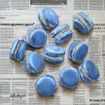  absurdres food food_focus highres julia_stankevych macaron newspaper no_humans oil_painting_(medium) original painting_(medium) realistic signature still_life traditional_media wall_of_text 