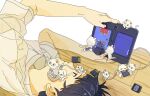  1boy black_hair cat charger game_cartridge handheld_game_console highres lying male_focus nintendo_ds nintendo_dsi on_floor on_side original parted_lips playing_games shirt short_hair short_sleeves solo stylus t-shirt white_shirt wooden_floor yuuki_(illust2002) 