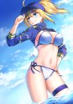  1girl ahoge artoria_pendragon_(all) bangs baseball_cap bikini blonde_hair blue_eyes blue_headwear blue_sky breasts cloud cloudy_sky commentary_request contrapposto day dutch_angle eyebrows_visible_through_hair fate/grand_order fate_(series) gogatsu_fukuin grin groin hair_between_eyes hair_through_headwear hand_on_headwear hand_on_hip hand_up hat high_ponytail highres large_breasts long_sleeves looking_away looking_to_the_side mysterious_heroine_x navel outdoors ponytail shrug_(clothing) side-tie_bikini sidelocks signature skindentation sky smile solo swimsuit thigh_strap v-shaped_eyebrows wading water wet white_bikini 