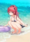  1girl animal_ears bare_arms bare_legs bare_shoulders barefoot beach bikini black_bikini breasts caustics chigusa_asuha cleavage closed_mouth collarbone commentary_request day fake_animal_ears fake_tail hair_ornament hair_scrunchie hairclip halterneck innertube long_hair looking_at_viewer outdoors ponytail qualidea_code red_eyes red_hair sand scrunchie sekiya_asami shadow sidelocks small_breasts solo squatting sunlight swimsuit tail thighs water 