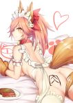  1girl animal_ears apron ass ass_tattoo bell bell_collar blush breasts collar fate/extra fate/grand_order fate_(series) food fox_ears fox_tail hair_ornament heart highres large_breasts looking_back lying naked_apron no_panties on_bed on_stomach pink_hair smile solo tail tamamo_(fate)_(all) tamamo_cat_(fate) tamamo_no_mae_(fate) uchisukui yellow_eyes 