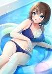  1girl :d bangs bare_arms bare_shoulders bikini blue_bikini blue_eyes blush breasts brown_hair cleavage collarbone commentary_request eyebrows_visible_through_hair feet_out_of_frame fingernails hair_between_eyes highres innertube lying medium_breasts minami_saki navel on_back open_mouth original smile solo swimsuit water 