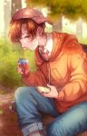  1boy absurdres bench blue_pants blurry blurry_background brown_eyes brown_hair cellphone dappled_sunlight day denim drinking_straw highres holding holding_cellphone holding_phone hood hoodie jeans juice_box long_sleeves looking_at_viewer male_focus mocohi123 necktie orange_hoodie original outdoors pants phone pink_headwear sideways_hat sitting smile solo sunlight 