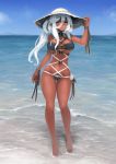  1girl bangs barbariank bare_legs bare_shoulders barefoot black_ribbon breasts commentary dark_skin day ear_ornament english_commentary eyebrows_visible_through_hair full_body hair_between_eyes hair_ribbon hand_on_headwear hat highres horizon large_breasts long_hair looking_at_viewer navel o-ring o-ring_top original outdoors parted_lips pointy_ears ponytail red_eyes ribbon sidelocks smile solo standing strapless sun_hat tubetop wading water waves white_hair wrist_ribbon 