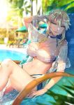  ahoge alternate_costume arm_up artoria_pendragon_(all) artoria_pendragon_(lancer) bangs beach_umbrella braid breasts choker cleavage commentary_request day deck_chair fate/grand_order fate_(series) french_braid green_eyes hair_between_eyes highres jewelry large_breasts light_smile lips looking_at_viewer navel necklace off_shoulder outdoors palm_tree pool poolside redrop shade shiny shiny_skin sidelocks sitting solo_focus sparkle swept_bangs swimsuit tree umbrella 