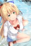  1girl azur_lane bikini bikini_under_clothes blonde_hair bow breasts cleavage collarbone downblouse green_eyes hair_bow highres in_water large_breasts le_temeraire_(azur_lane) long_hair long_sleeves open_clothes ponyaru shirt smile solo swimsuit very_long_hair wet wet_clothes wet_shirt 