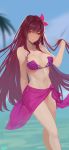  1girl bangs bare_shoulders beach bikini breasts closed_mouth collarbone d.sum fate/grand_order fate_(series) flower hair_between_eyes hair_flower hair_intakes hair_ornament hibiscus highres large_breasts long_hair looking_at_viewer navel purple_bikini purple_hair red_eyes sarong scathach_(fate)_(all) scathach_(swimsuit_assassin)_(fate) smile solo swimsuit thighs 
