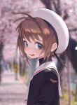  absurdres antenna_hair beret blurry blurry_background brown_hair cardcaptor_sakura charles charles_(106858) cherry_blossoms green_eyes hat highres kinomoto_sakura school_uniform short_hair tomoeda_elementary_school_uniform 