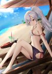  1girl arm_ribbon bangs barefoot beach blue_sky closed_mouth cloud day dutch_angle fate/grand_order fate_(series) floating_hair from_side hair_between_eyes hand_in_hair high_ponytail highres long_hair looking_at_viewer miyamoto_musashi_(fate/grand_order) outdoors red_eyes red_ribbon ribbon sarong silver_hair sitting sky smile solo tana_alive tomoe_gozen_(fate/grand_order) white_bikini_top 