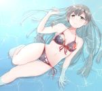  1girl bikini black_hair brown_eyes eyebrows_visible_through_hair idolmaster idolmaster_cinderella_girls kobayakawa_sae long_hair lying_on_water nabu_(xday) string_bikini swimsuit water wet 