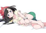  1girl barefoot beanie black_hair blue_eyes green_shorts hat ixy looking_at_viewer lying mizuki_(pokemon) on_side pokemon pokemon_(game) pokemon_sm red_headwear shirt short_hair short_sleeves shorts simple_background smile white_background yellow_shirt 