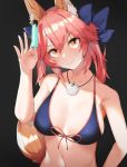  1girl animal_ear_fluff animal_ears bikini black_background blue_bikini blue_ribbon breasts cleavage closed_mouth collarbone commentary eyebrows_visible_through_hair fate/grand_order fate_(series) food fox_ears fox_girl fox_tail hair_ribbon highres ice large_breasts light_smile mokakeke pink_hair ribbon side-tie_bikini simple_background solo swimsuit tail tamamo_(fate)_(all) tamamo_no_mae_(swimsuit_lancer)_(fate) yellow_eyes 