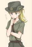  1girl arm_grab bangs beige_background belt blonde_hair blunt_bangs brown_belt chin_grab closed_mouth collared_shirt commentary_request frown girls_und_panzer green_eyes green_headwear green_shorts hair_ribbon hat koala_forest_military_uniform long_hair medium_hair military military_uniform mutsu_(layergreen) ponytail ribbon sam_browne_belt shirt short_sleeves shorts simple_background solo standing sweatdrop translated uniform upper_body wallaby_(girls_und_panzer) 