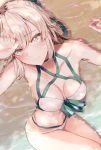  1girl bangs bare_legs bare_shoulders beach bikini blush bow breasts cleavage closed_mouth collarbone eyebrows_visible_through_hair eyes_visible_through_hair fate/grand_order fate_(series) fingernails from_above front-tie_bikini front-tie_top hair_bow hair_ribbon hand_up highleg highleg_bikini highres ka1se1 layered_bikini legs_together looking_at_viewer lying multi-strapped_bikini okita_souji_(fate) okita_souji_(fate)_(all) okita_souji_(swimsuit_assassin)_(fate) outdoors petals ribbon sand short_hair smile solo swimsuit water white_bikini yellow_eyes 