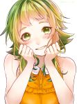  1girl bare_shoulders blush clenched_hands collar commentary frilled_shirt frills green_eyes green_hair gumi hands_on_own_cheeks hands_on_own_face head_rest highres looking_at_viewer mai_mugi open_mouth orange_shirt shirt short_hair_with_long_locks shoulder_blush sidelocks simple_background sleeveless sleeveless_shirt smile solo talking twitter_username upper_body vocaloid white_background white_collar 