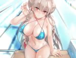  1girl ahoge alternate_costume azur_lane bangs bikini blue_bikini blurry blurry_background blush braid breasts choker cleavage collarbone covered_nipples day double_bun formidable_(azur_lane) formidable_(the_lady_of_the_beach)_(azur_lane) groin hand_up head_tilt indoors large_breasts long_hair looking_at_viewer misako12003 navel pool poolside red_eyes ribbon sidelocks sitting solo stomach swimsuit twitter_username very_long_hair water wet 