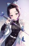  1girl bangs belt black_hair breasts bug butterfly butterfly_hair_ornament commentary_request hair_ornament haori hinaki_(hinaki_0102) holding holding_sword holding_weapon insect japanese_clothes katana kimetsu_no_yaiba kochou_shinobu long_sleeves looking_at_viewer parted_bangs purple_eyes purple_hair short_hair smile solo sword uniform weapon white_belt 