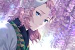  1boy bangs blue_eyes blurry closed_mouth depth_of_field dutch_angle facial_scar flower highres japanese_clothes kimetsu_no_yaiba looking_at_viewer male_focus mask mask_on_head medium_hair pink_hair portrait purple_flower sabito_(kimetsu) scar scar_on_cheek smile solo tsuyu_(gunjooo9) wisteria 