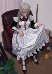  1girl animal_ears bangs breasts cat_ears chair cushion fkey grey_hair highres long_hair maid mary_janes original pantyhose plant red_eyes shoes sitting solo white_legwear yarn yarn_ball 