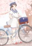  1girl aaoi bicycle bicycle_basket black_hair blue_sailor_collar brown_eyes cherry_blossoms cherry_tree dress dutch_angle full_body hat hiburi_(kancolle) highres kantai_collection low_ponytail petals sailor_collar sailor_dress sailor_hat short_hair short_ponytail short_sleeves smile solo white_dress white_headwear 