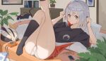  1girl alternate_costume ass black_shirt black_socks breasts cabinet camera cat couch digital_media_player earphones food_in_mouth foot_out_of_frame grey_hair highres holding holding_earphones honkai:_star_rail honkai_(series) indoors kneehighs knees_up looking_at_viewer lycsakd lying medium_breasts multicolored_hair numby_(honkai:_star_rail) on_back on_couch outstretched_leg panties pillow plant potted_plant purple_eyes reclining red_hair red_shirt shirt socks solo streaked_hair thighs topaz_(honkai:_star_rail) trotter_(honkai:_star_rail) underwear white_panties 