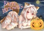  1girl animal_ears bandaged_arm bandaged_head bandaged_leg bandages breasts fate/kaleid_liner_prisma_illya fate_(series) full_moon gloves halloween halloween_costume happy_halloween illyasviel_von_einzbern jack-o&#039;-lantern long_hair lying mikujin_(mikuzin24) moon naked_bandage night night_sky on_side paw_gloves paw_shoes paws pumpkin red_eyes shoes sky small_breasts smile solo tail white_hair 