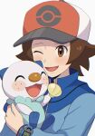  1boy ;d blue_jacket blush brown_eyes brown_hair happy hat highres hilbert_(pokemon) holding holding_pokemon jacket long_sleeves male_focus nakikot_t one_eye_closed open_mouth oshawott pokemon pokemon_(creature) pokemon_bw seashell shell short_hair smile xtransceiver 