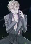  1boy alien_stage blonde_hair colored_extremities colored_eyelashes commentary grey_pants grey_shirt headset highres long_sleeves luka_(alien_stage) male_focus microphone open_mouth pants s301t9 shirt short_hair sitting solo yellow_eyes 