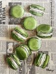  absurdres food food_focus highres julia_stankevych macaron newspaper no_humans oil_painting_(medium) original painting_(medium) realistic signature still_life traditional_media wall_of_text 