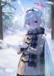  1girl absurdres alternate_costume bare_tree black_hairband blue_archive blue_scarf blush brown_jacket closed_mouth grey_eyes hair_over_one_eye hairband halo highres holding holding_snowball jacket long_hair looking_at_viewer plaid_clothes plaid_scarf plana_(blue_archive) red_halo red_pupils scarf sidelocks smile snacks00 snow snowball solo tree white_hair 