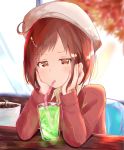  1girl autumn_leaves bang_dream! bangs beret blurry blurry_background blush brown_eyes brown_hair chair collared_shirt commentary_request cup dot_nose drink drinking drinking_glass drinking_straw elbows_on_table eyebrows_visible_through_hair hand_on_own_cheek hand_on_own_face hat hazawa_tsugumi highres indoors jacket long_sleeves looking_at_viewer plant potted_plant pout red_jacket red_sweater shirt short_hair sitting sleeve_cuffs solo striped sweater table tsugumochi upper_body white_headwear white_shirt wooden_table 