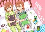  2girls animal_print barefoot bed box brown_eyes brown_hair cat_print digital_media_player earphones food frog frog_print from_above full_body gekota ha_neko head_mounted_display misaka_imouto misaka_imouto_10032 misaka_mikoto multiple_girls notebook pajamas pillow pink_background pocky polka_dot polka_dot_background saten_ruiko shirai_kuroko short_hair sitting stuffed_animal stuffed_frog stuffed_toy to_aru_kagaku_no_railgun to_aru_majutsu_no_index uiharu_kazari wariza 