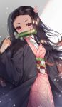  1girl bamboo bangs bit_gag black_hair black_haori fingernails gag hair_ribbon haori highres japanese_clothes kamado_nezuko kimetsu_no_yaiba kimono long_fingernails long_hair long_sleeves looking_at_viewer lying mouth_hold multicolored_hair on_back open_clothes orange_hair parted_bangs pink_eyes pink_kimono pink_nails pink_ribbon ribbon snow solo two-tone_hair user_uyfr2275 