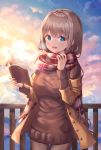  1girl :d bangs blue_eyes book bookmark breasts brown_coat brown_hair brown_pants brown_sweater cloud cloudy_sky coat commentary_request enpera eyebrows_visible_through_hair hands_up highres holding holding_book long_hair long_sleeves looking_at_viewer medium_breasts open_book open_clothes open_coat open_mouth original outdoors pants railing ribbed_sweater ruda_(ruda_e) scarf sky smile solo sunset sweater very_long_hair 