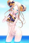  1girl abigail_williams_(fate/grand_order) bangs bare_shoulders bikini black_bikini_top black_bow blonde_hair blue_eyes blush bottomless bow breasts closed_mouth covering covering_crotch double_bun emerald_float fate/grand_order fate_(series) forehead frilled_bikini frills highres holding holding_hair hyuu_(sing-dog) long_hair looking_to_the_side multiple_bows orange_bow parted_bangs polka_dot polka_dot_bow scrunchie sidelocks small_breasts solo swimsuit thighs wading water wet wrist_scrunchie 