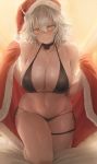  1girl absurdres backlighting bare_shoulders bikini black_bikini breasts choker christmas cleavage collarbone commentary fate/grand_order fate_(series) fur_trim groin hair_between_eyes halter_top halterneck hat highres holding jeanne_d&#039;arc_(alter)_(fate) jeanne_d&#039;arc_(fate)_(all) large_breasts looking_at_viewer navel o-ring o-ring_bikini red_headwear santa_hat side-tie_bikini silver_hair smile solo stomach swimsuit thigh_strap thighs v-shaped_eyebrows yellow_eyes yohan1754 